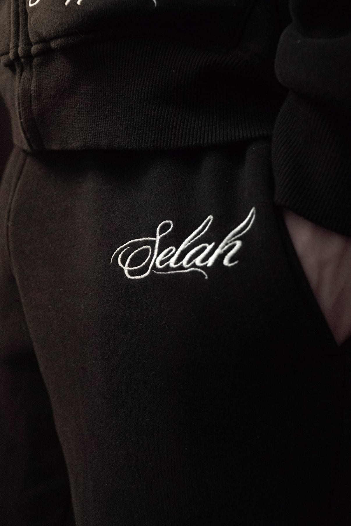 Hip embroidery detail on the Rosary Sweatpant